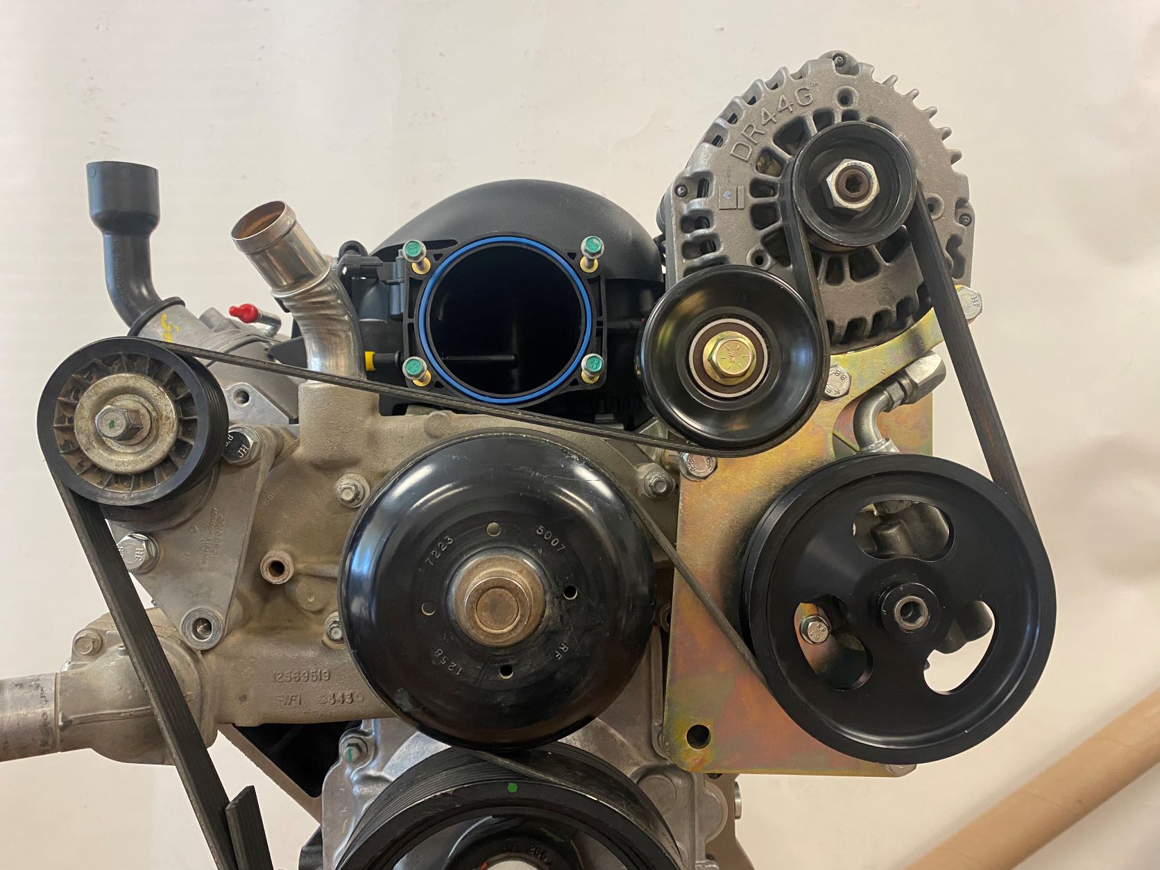 4421-F DRIVER SIDE CBR/TC PUMP AND ALTERNATOR MOUNT, F-BODY
