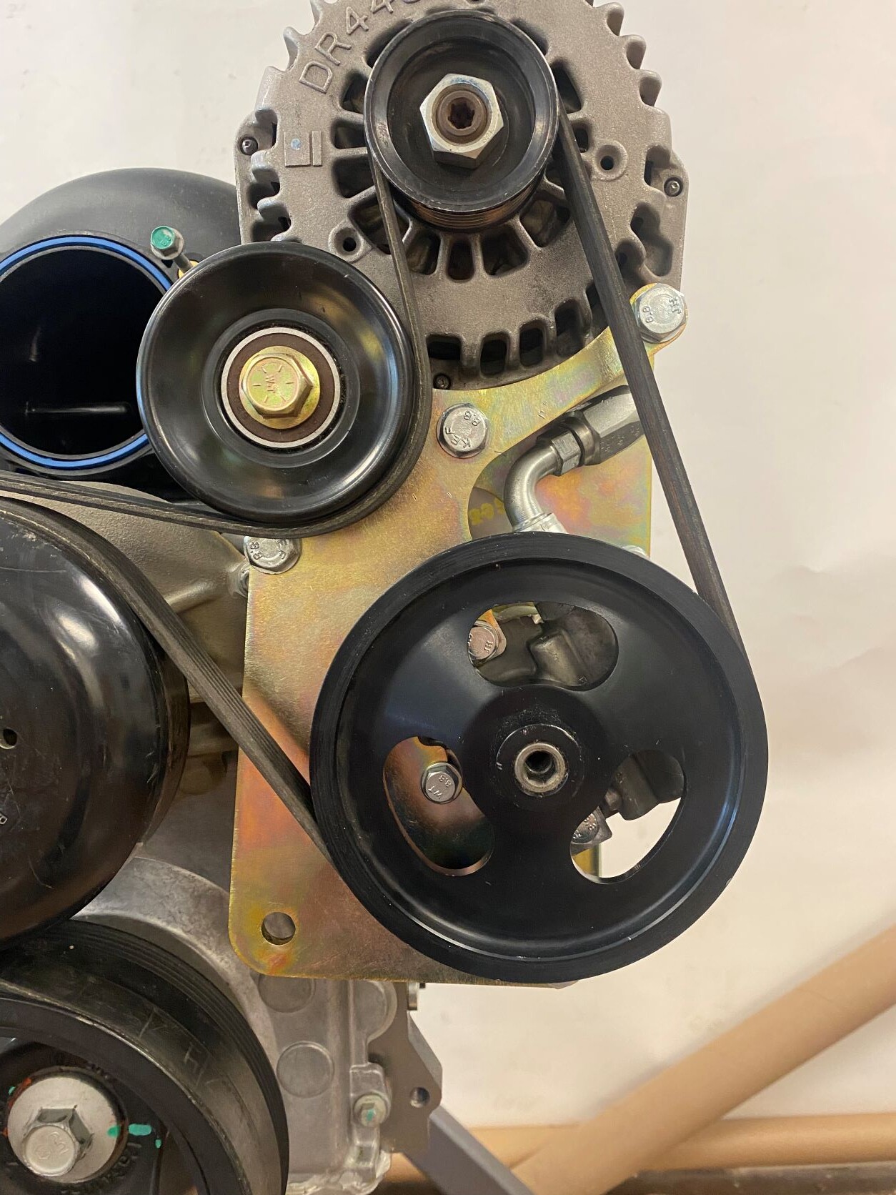 4421-F DRIVER SIDE CBR/TC PUMP AND ALTERNATOR MOUNT, F-BODY